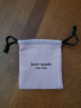 kate spade Pink Drawstring Jewelry Pouch with Green Cords